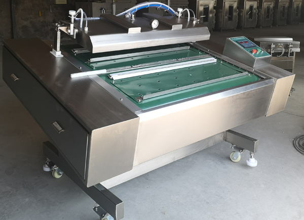 1000型滾動式真空包裝機